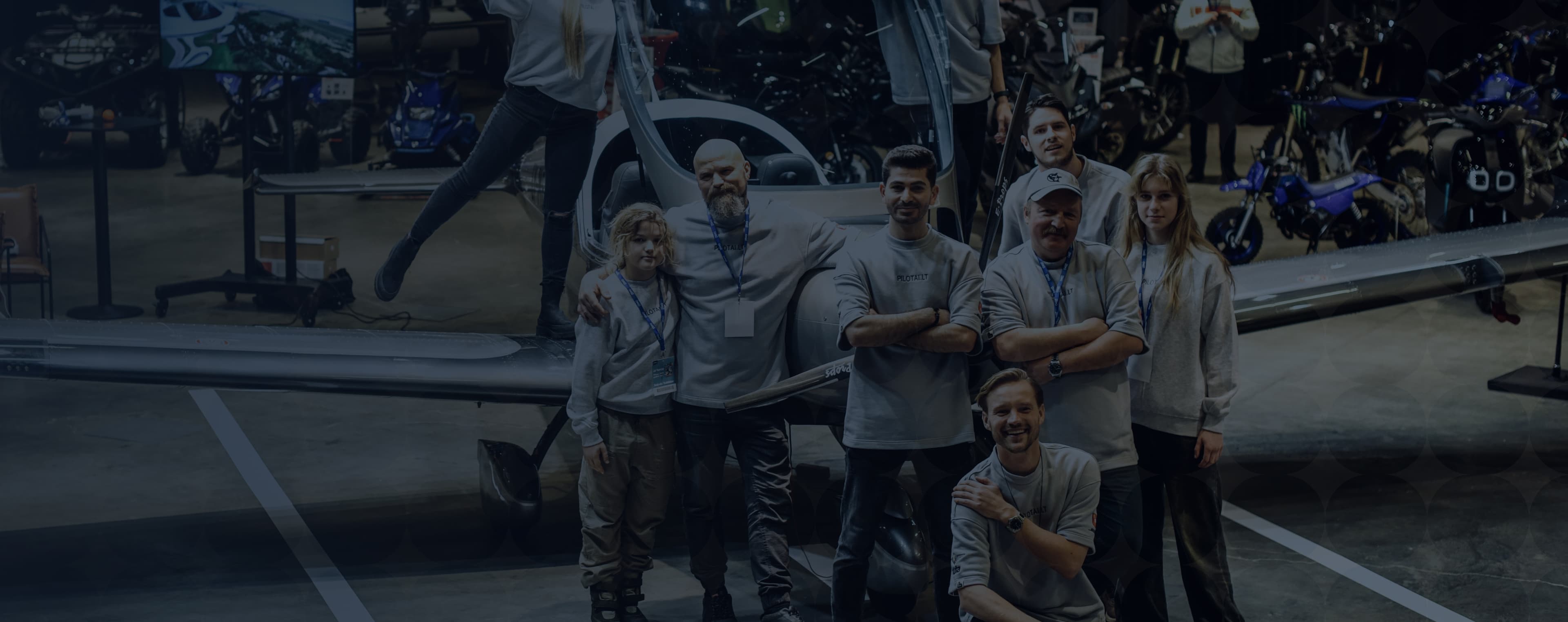 Pilotai Program team near aircraft