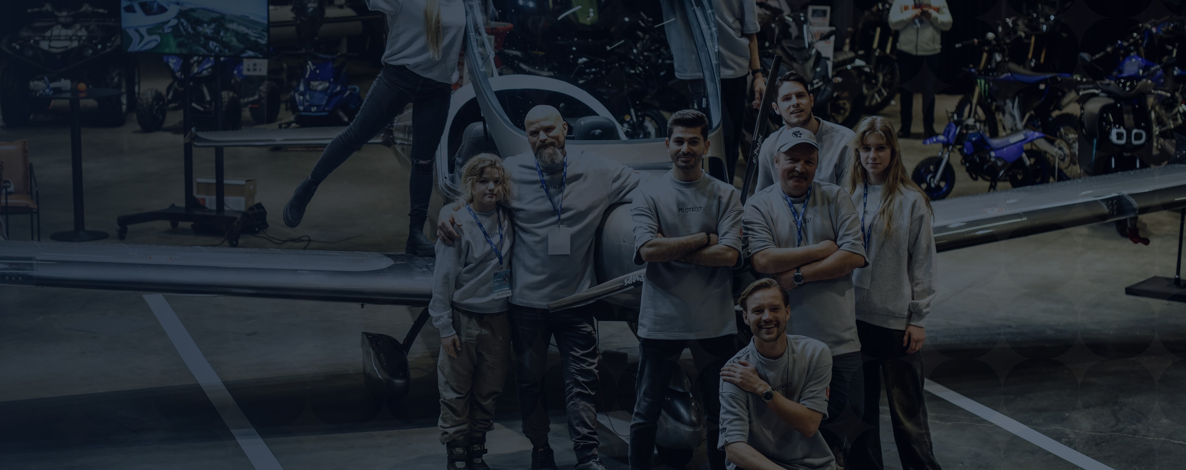 Pilotai Program team near aircraft